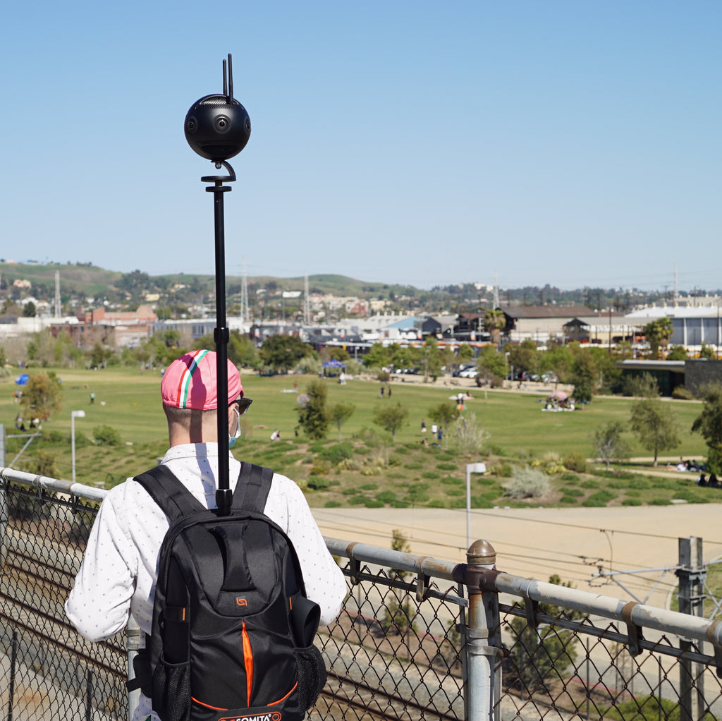 Monopole Backpack Raise the Camera Above the Obstructions